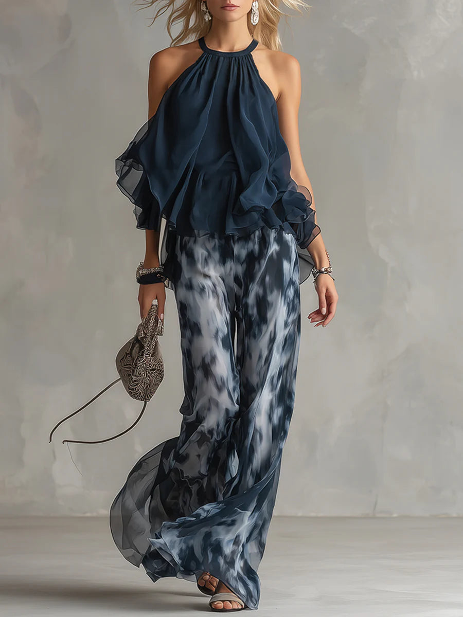 Conjunto azul marino de gasa con parte superior halter y pantalón ancho estampado