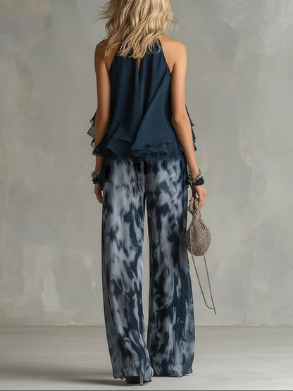 Conjunto azul marino de gasa con parte superior halter y pantalón ancho estampado