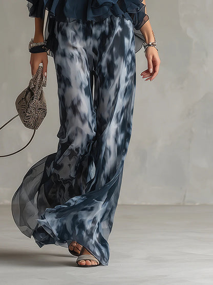 Conjunto azul marino de gasa con parte superior halter y pantalón ancho estampado