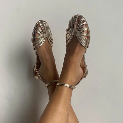 SANDALIA PLANA TRENZADA