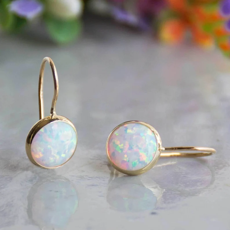 Pendientes dorados con ópalo vintage